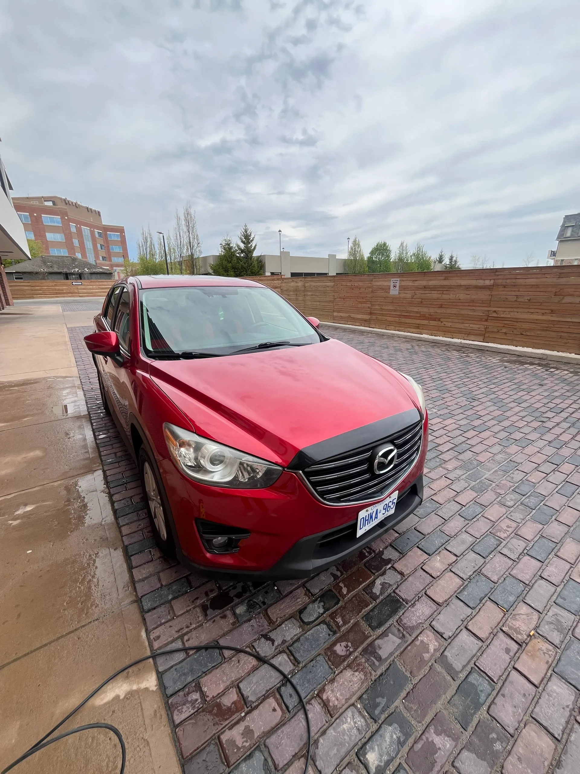 Red Mazda exterior auto detail — paint restoration, Toronto